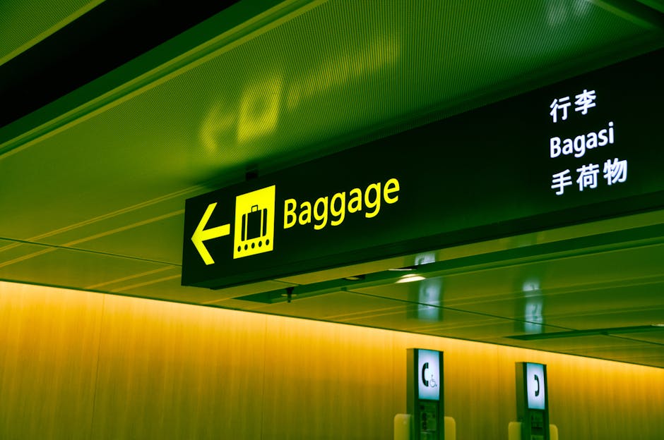Illuminated airport baggage sign with multilingual translations