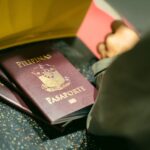 ESTA US travel — american flag passport airport 1
