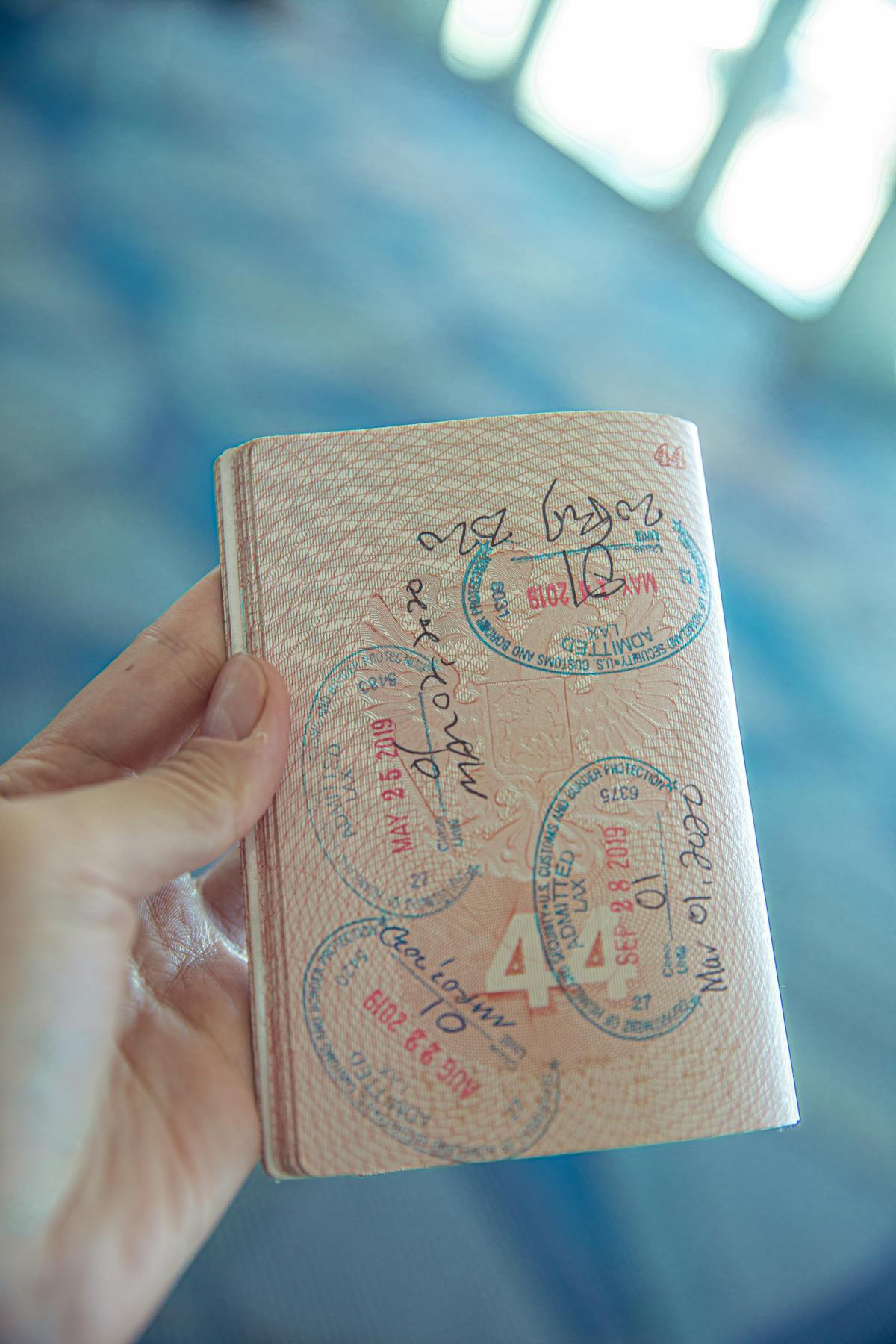 Frequent traveler at a US airport border control desk
