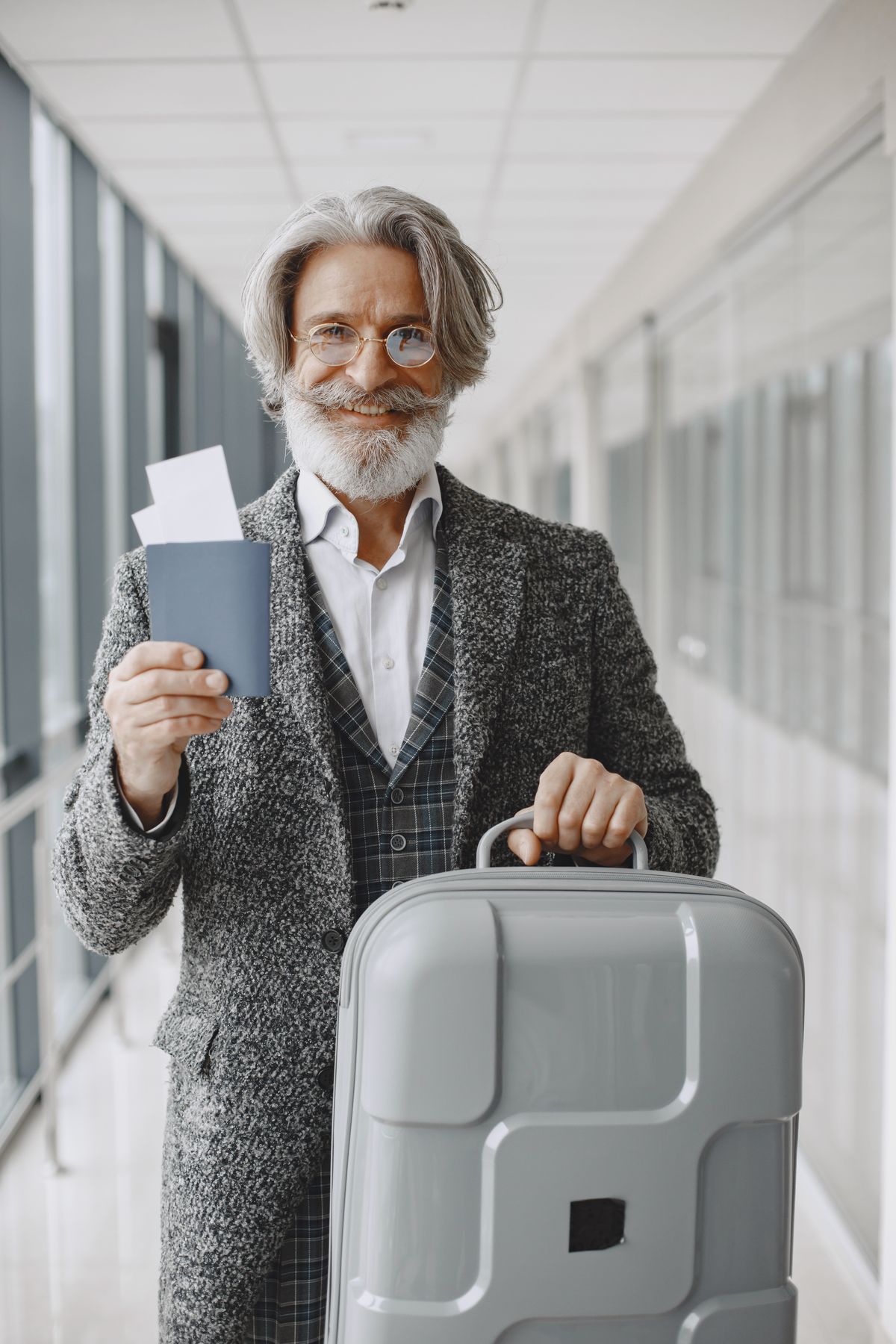 Suitcase with flight tags for the US and Europe on a single trip