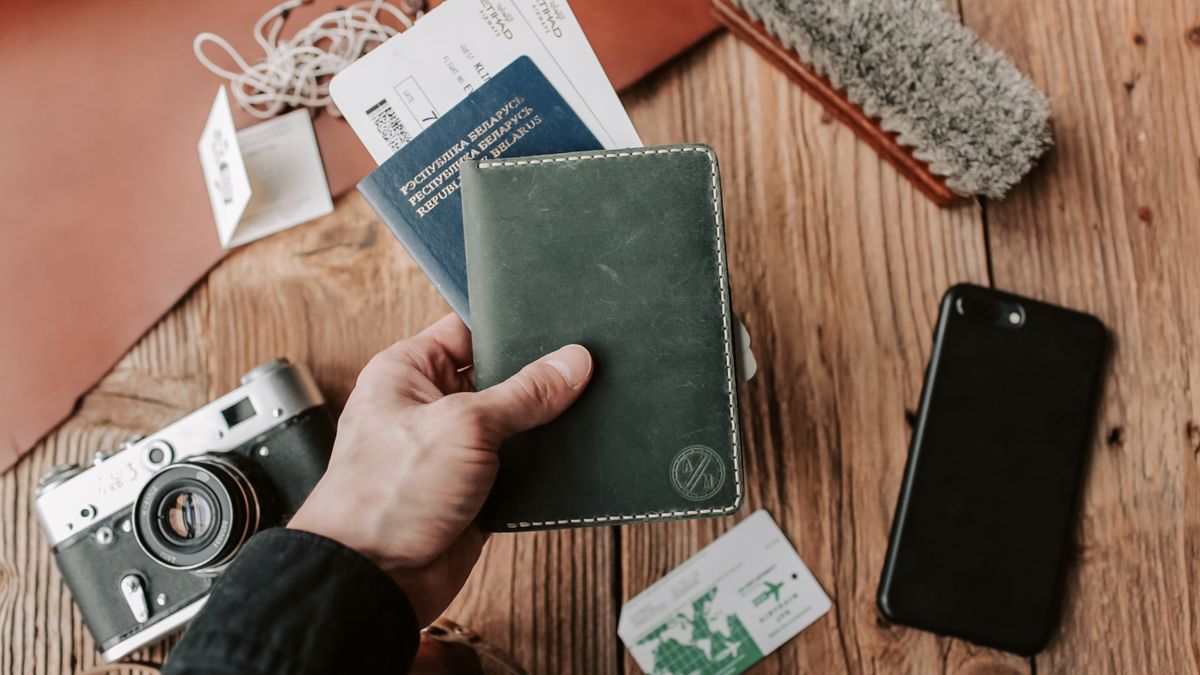 Holding a passport and boarding pass to avoid ESTA transit refused problems