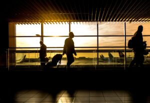 Diverse group of international travelers with passports at a US airport