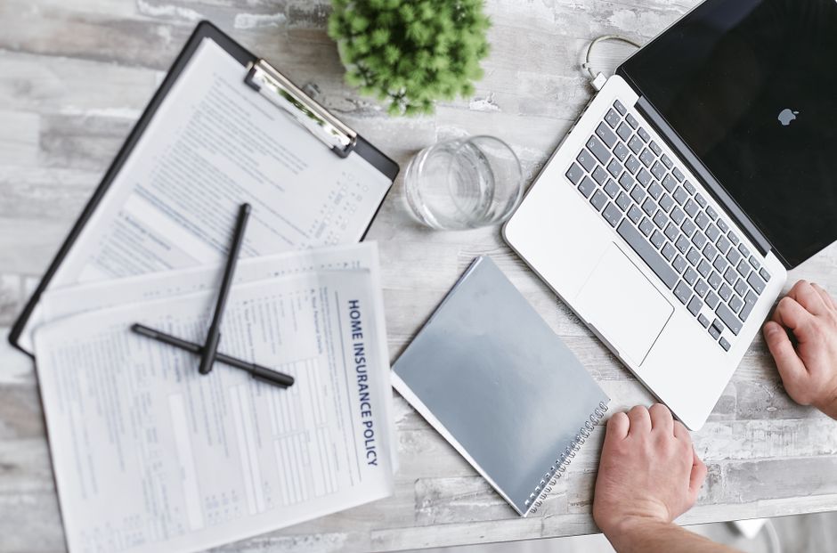 Family preparing several passports together before applying online in one session