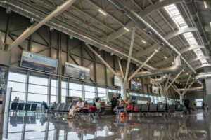 Quiet US airport terminal at night representing overnight layovers for ESTA visitors in 2026