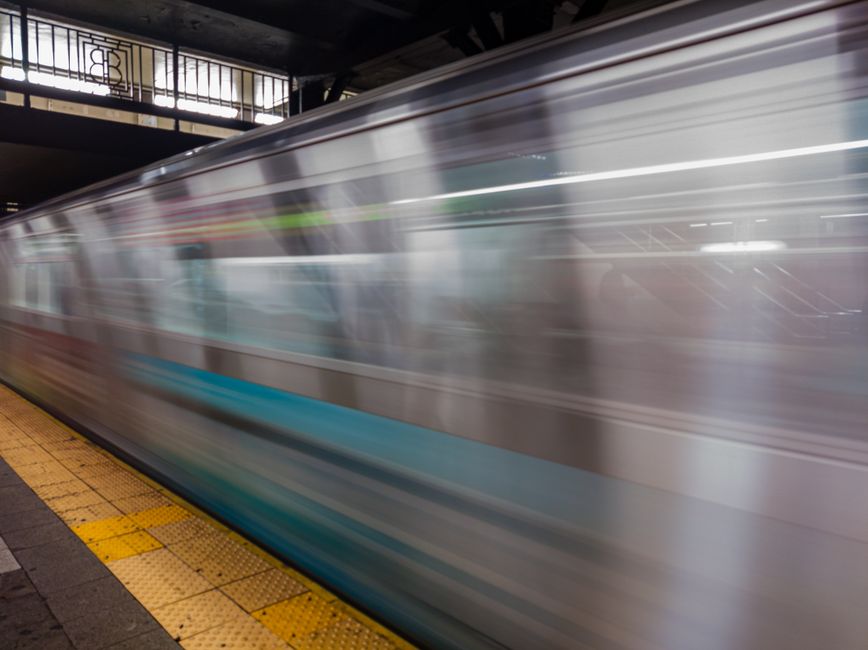 Commuters riding an American metro carriage during a city visit